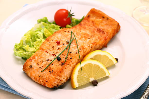 istock Grilled salmon filet and vegetables 484288253