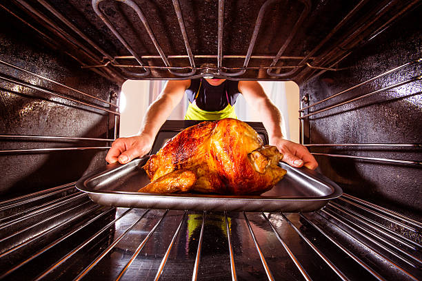 istock Cooking chicken in the oven at home. 484288988