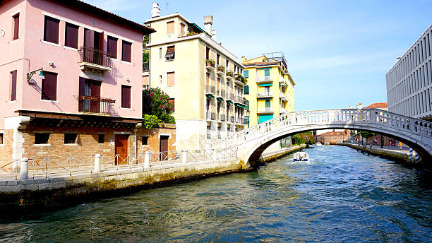 istock canal and bridge with ancient buildings 484288994