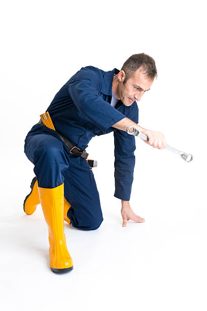 istock Portrait of an handsome Worker using a wrench 484289323