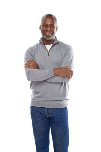 Portrait of confident african middle aged man against white background