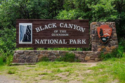 Gunnison, Colorado, United States - June 28, 2015: The welcome sign to Black Canyon of the Gunnison National Park