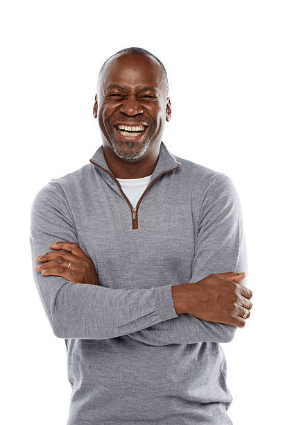 istock Middle aged african man laughing on white 484291719