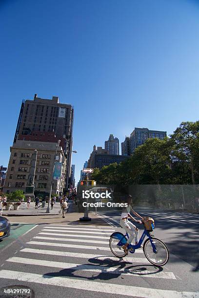 Pretty Hip Lady Cycling Nyc Stock Photo - Download Image Now - 2015, Adult, Asphalt