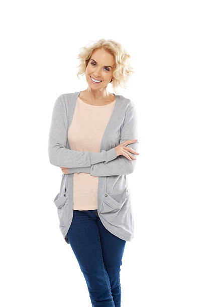 istock Beautiful mature lady standing on white 484291837