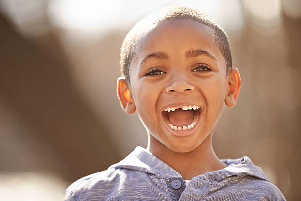 No truer feeling than the happiness of a child Portrait of a cute little boy enjoying a day outdoorshttp://195.154.178.81/DATA/i_collage/pu/shoots/805409.jpg gap toothed stock pictures, royalty-free photos & images