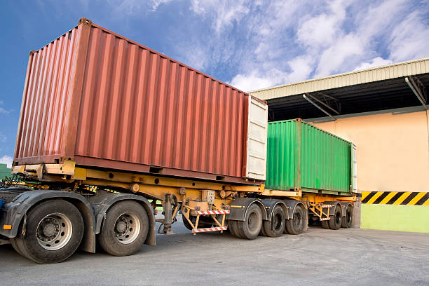 istock Trailers parking at warehouse to load products 484294675