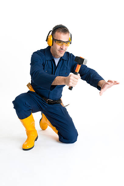 istock Portrait of an handsome Worker using a hammer 484295127