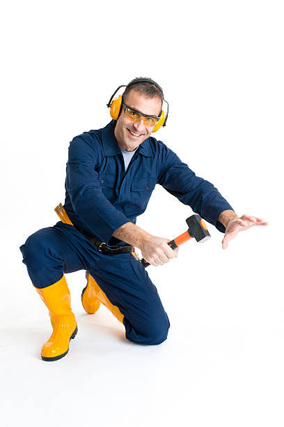 istock Portrait of an handsome Worker using a hammer 484295143