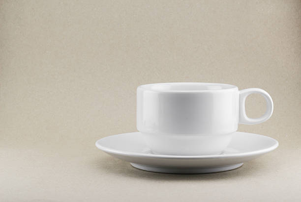 istock White Cup of Coffee or Tea in brown background 484295320