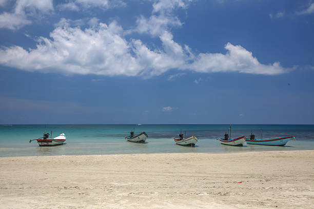 istock small boats floating around on the sea 484295390