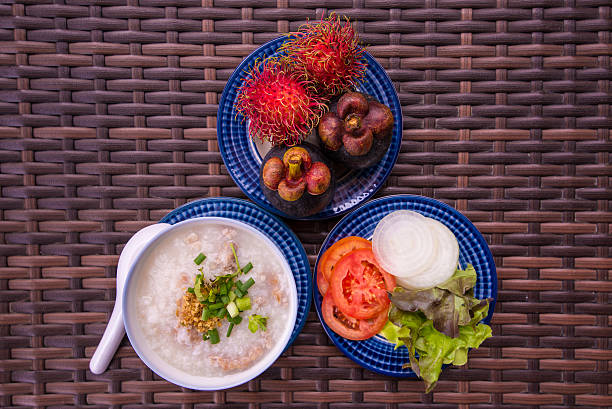 istock rice gruel in bowl on tablecloth in morning 484295526