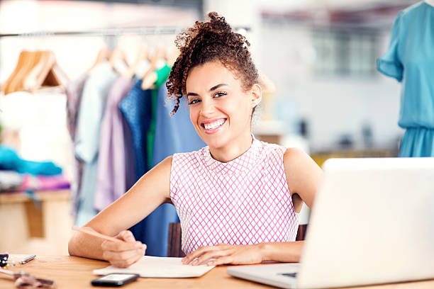 istock Happy Fashion Designer Sketching On Paper In Studio 484296432