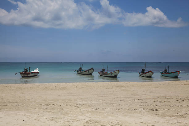 istock small boats floating around on the sea 484296866