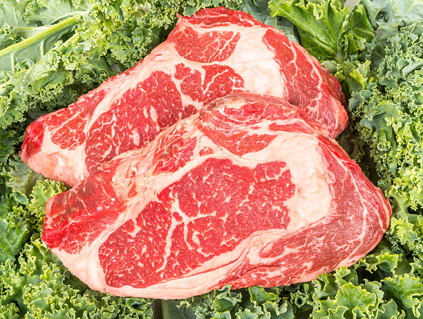 istock Beef rib eye on the salad leafs 484297028