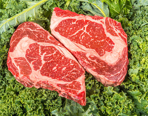 istock Beef rib eye on the salad leafs 484297346