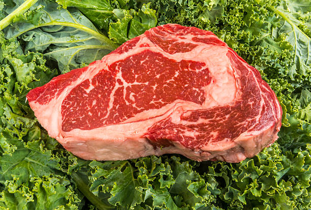 istock Beef rib eye on the salad leafs 484297352