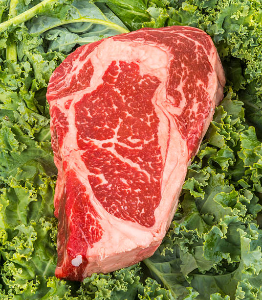 istock Beef rib eye on the salad leafs 484297356
