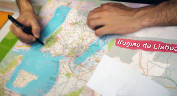 istock Checking For Direction With Region Of Lisbon Paper Map 484302626