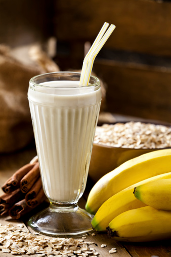 Oat and Banana Smoothie on Wooden Table