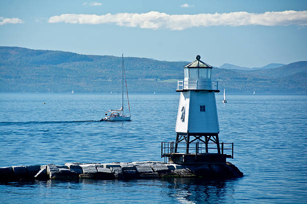 istock Boats behind Burlington light house 484309805