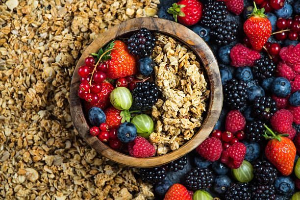 istock Crunchy granola nad fresh berries, diet concept 484309894
