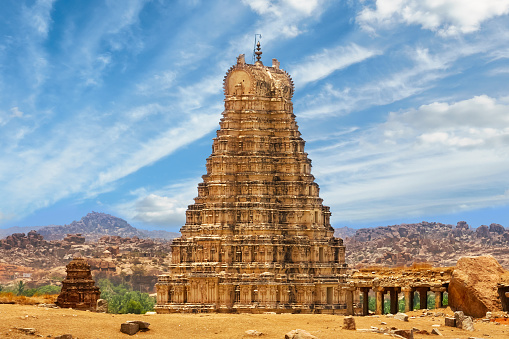 Photo of the landmark Virupaksha Temple also known as Pampapathi Temple in Hampi, Karnataka state, southern India. It is part of the Group of Monuments at Hampi, designated a UNESCO World Heritage Site.
