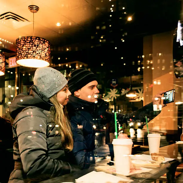 Photo of Man and women in the Starbucks cafe