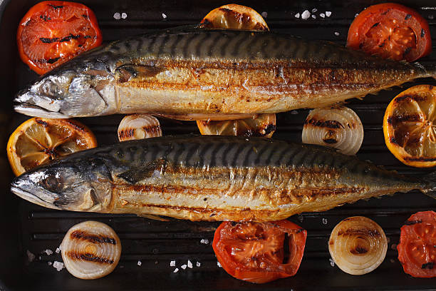 istock Grilled mackerel fish on the grill closeup horizontal top view 484311512
