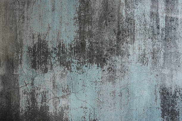 istock dirty old green weathered painted wall as background 484311654