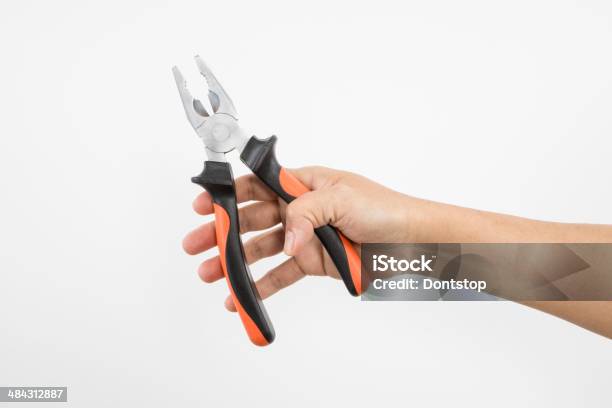 Nippers In Hand Stock Photo - Download Image Now - Adjustable, Blue-collar Worker, Close-up