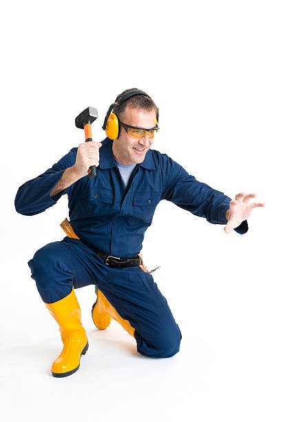 istock Portrait of an handsome Worker using a hammer 484313007