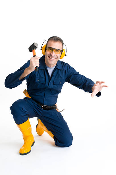 istock Portrait of an handsome Worker using a hammer 484313009