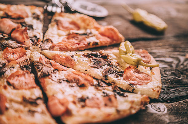 istock Homemade Pizza with ham and mushrooms 484317882