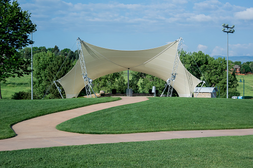 An awning covers an amphitheater in a public park