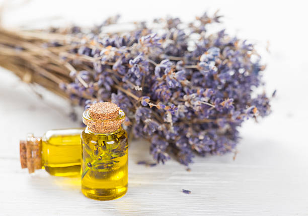 istock Lavender flowers with essential oil. Spa and wellness concept. 484323976