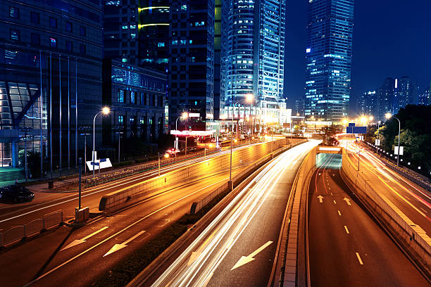 istock traffic in shanghai at night 484324335