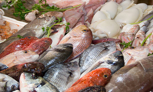 Mixed fish for sale on a market Mixed fish for sale on a market sebastinae photos stock pictures, royalty-free photos & images