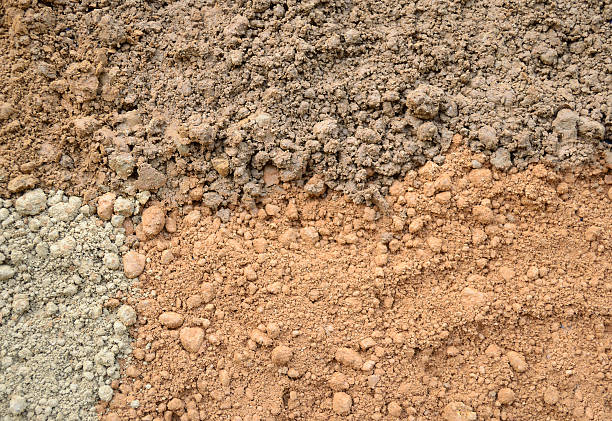 Four color soil background Natural silty soil background: brown, gray and red. natural pattern pattern nature rock stock pictures, royalty-free photos & images
