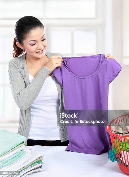 Laundry At Home Stock Photo - Download Image Now - Adult, Adults Only, Asian and Indian Ethnicities