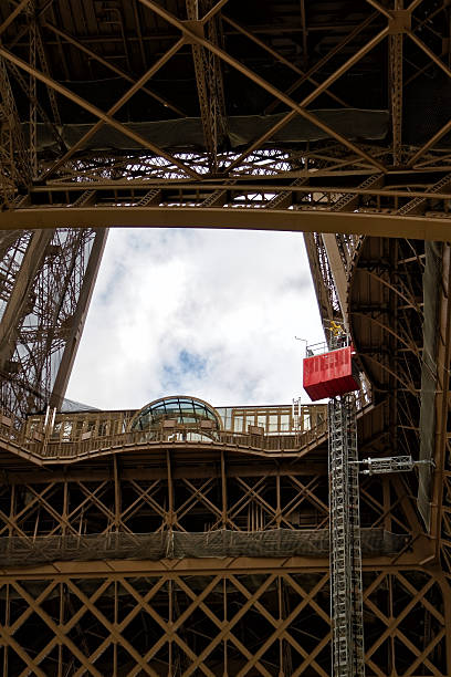 Eiffel Tower and lift (Paris, France). stock photo