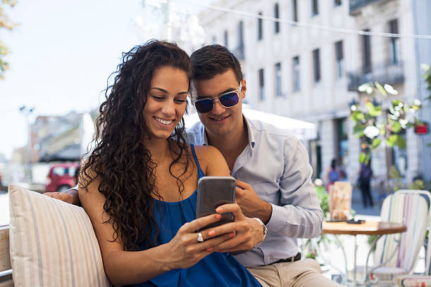 istock Catching memories by stylish young couple 484334596