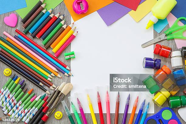 School Supplies On The Desk Stock Photo - Download Image Now - Backgrounds, Craft, Crayon
