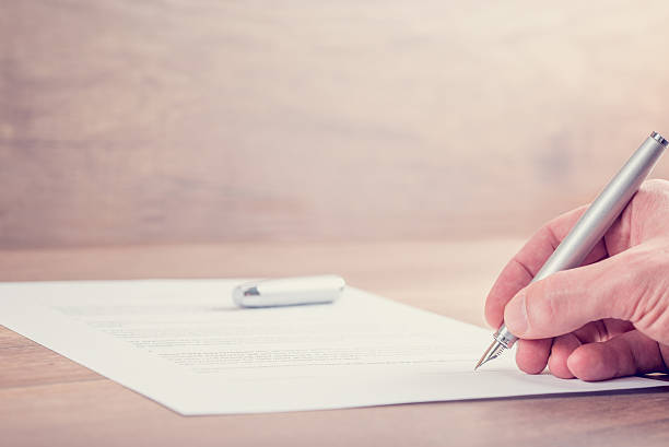 istock Closeup of signing contract 484338776