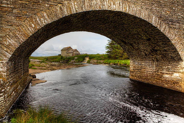istock Old stone mill and bridge in Thurso, Scotland 484342804