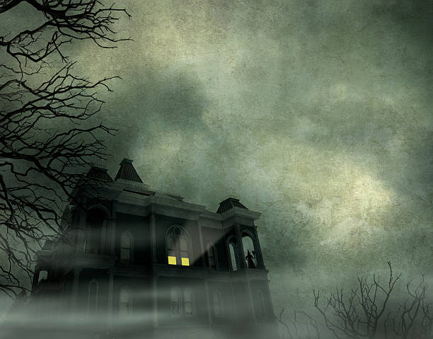 istock Haunted House Framed By Barren Trees 484342878