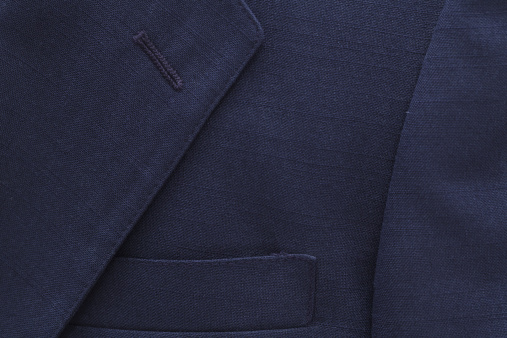 Close up view of blue suit coat...