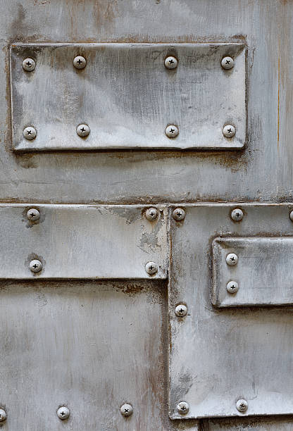 istock structure of old metal with screw 484345153