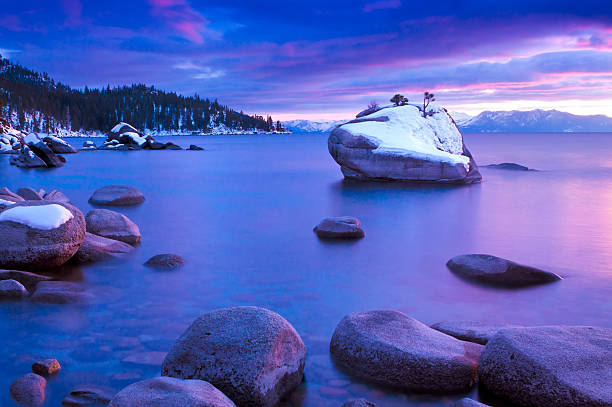 Bonsai Rock Lake Tahoe Winter Sunset.  Sky and water have beautiful colors.