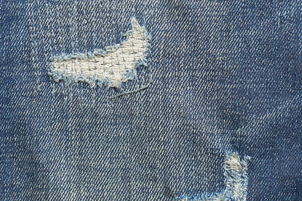 istock denim jeans blue old torn with fashion design 484346636